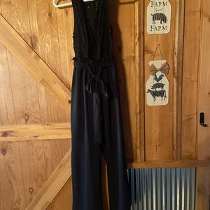 Womens size small Rue21 black jump suit